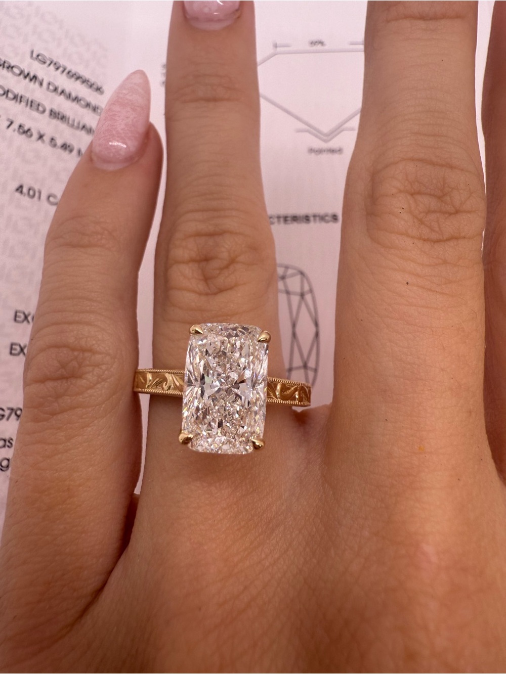 4.01 carat F VVS2 cushion lab diamond with engraved band engagement ring